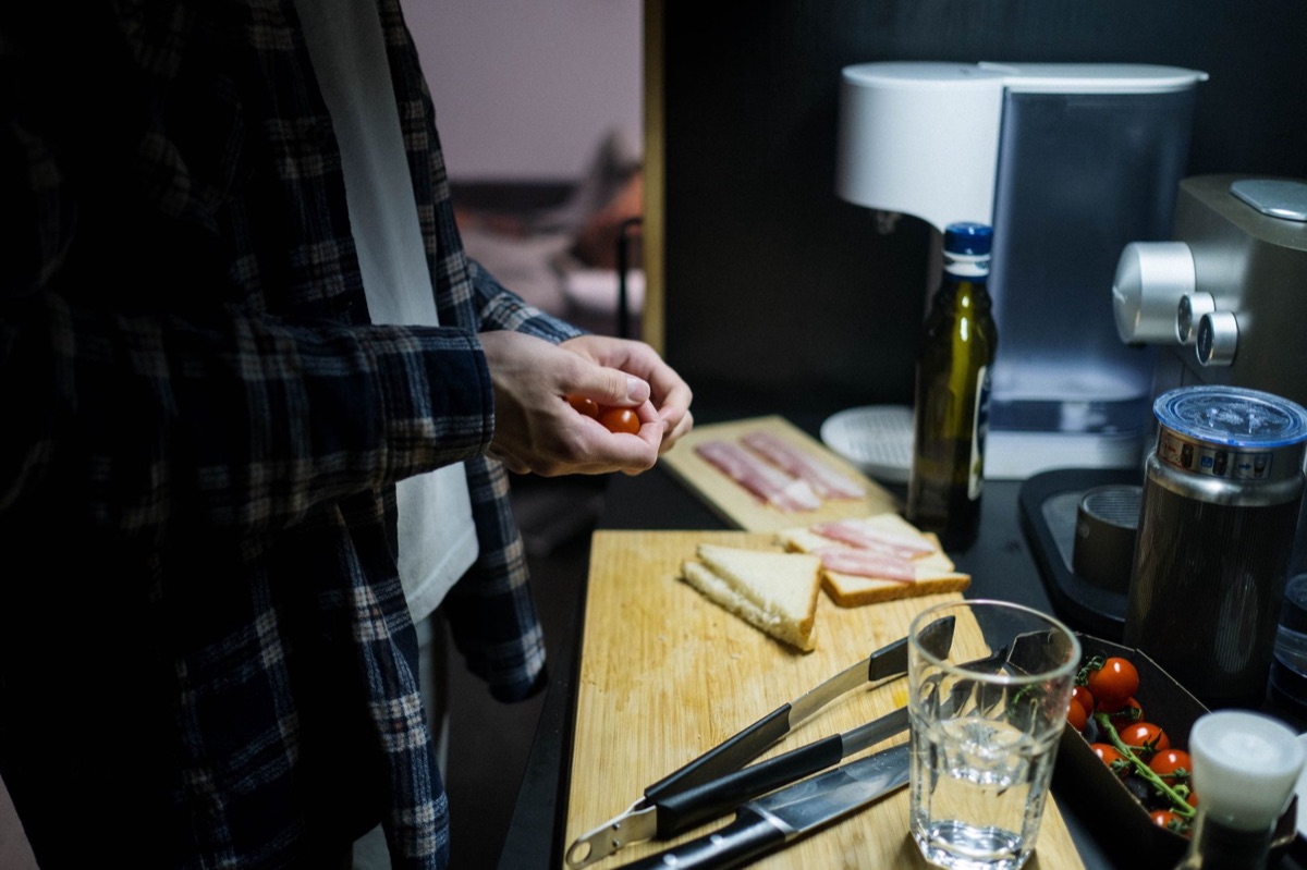 Cuban sandwich ingredients laid out on a wooden surface