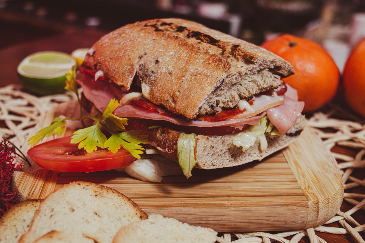 Cuban sandwich slicing with bread