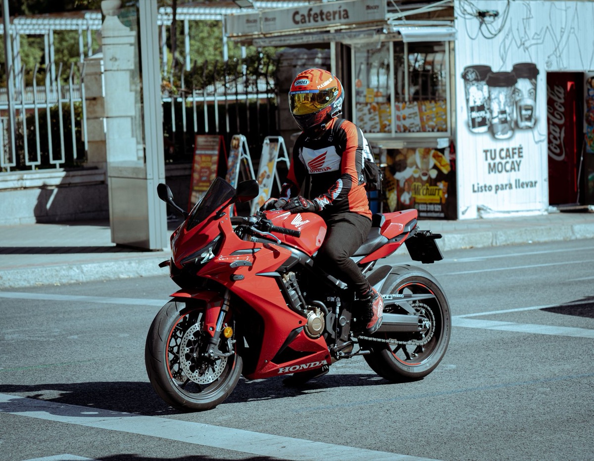 motorcycle rider at traffic light